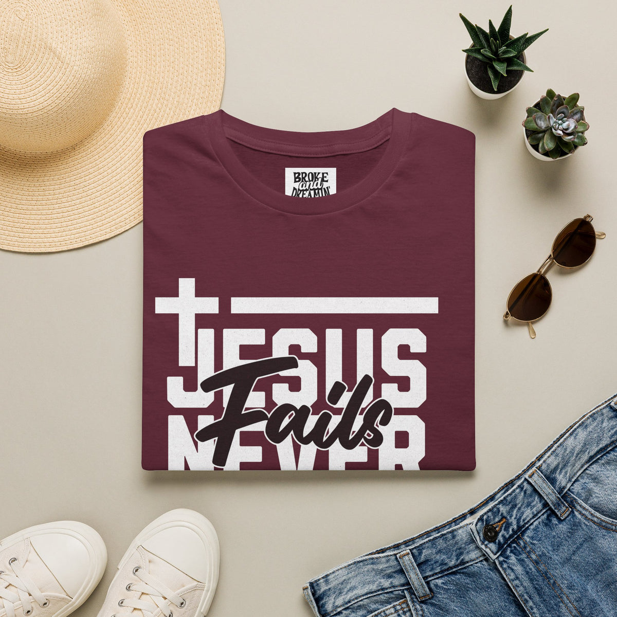 "Jesus Never Fails” Unisex T-Shirt - Broke & Dreamin' T-Shirts