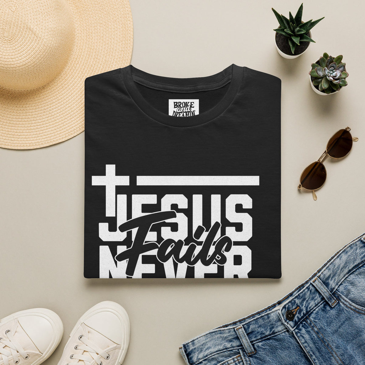 "Jesus Never Fails” Unisex T-Shirt - Broke & Dreamin' T-Shirts