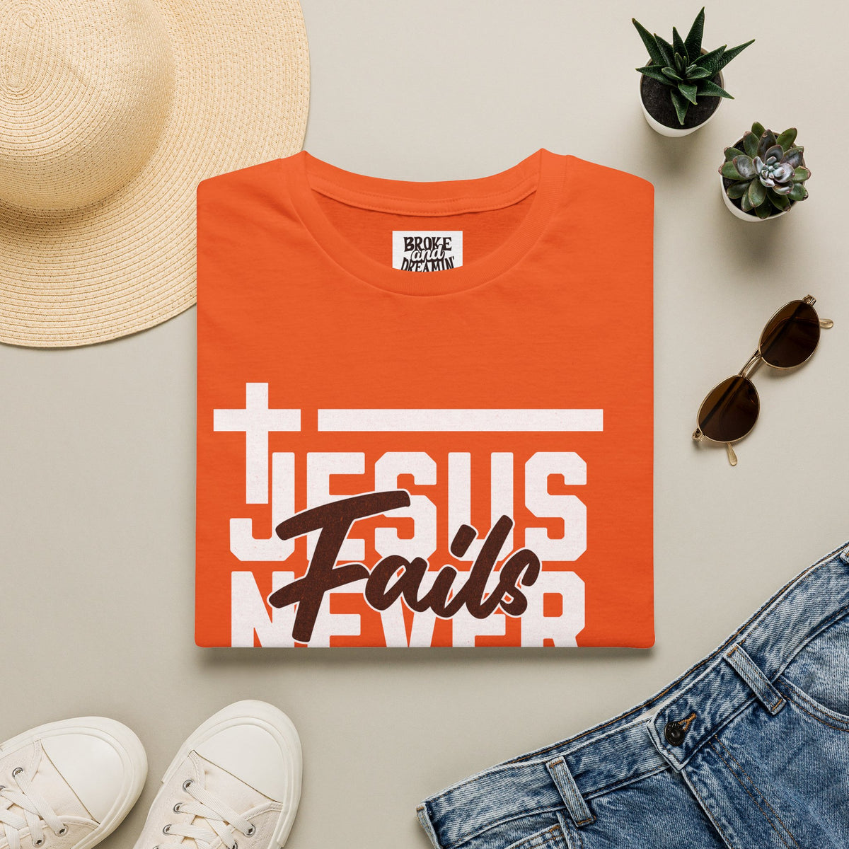 "Jesus Never Fails” Unisex T-Shirt - Broke & Dreamin' T-Shirts
