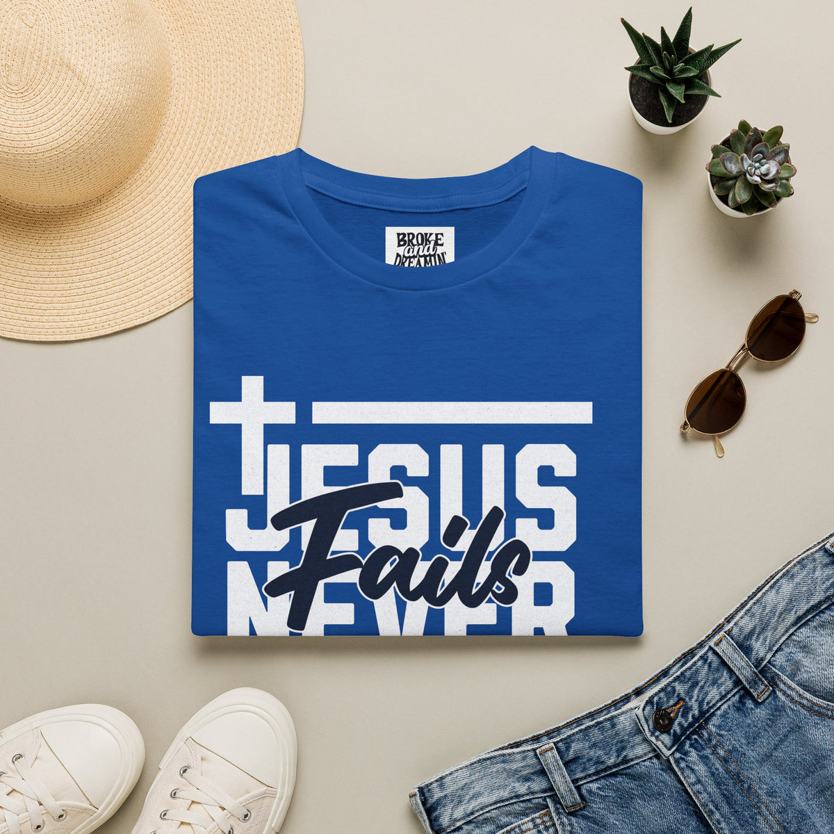 "Jesus Never Fails” Unisex T-Shirt - Broke & Dreamin' T-Shirts