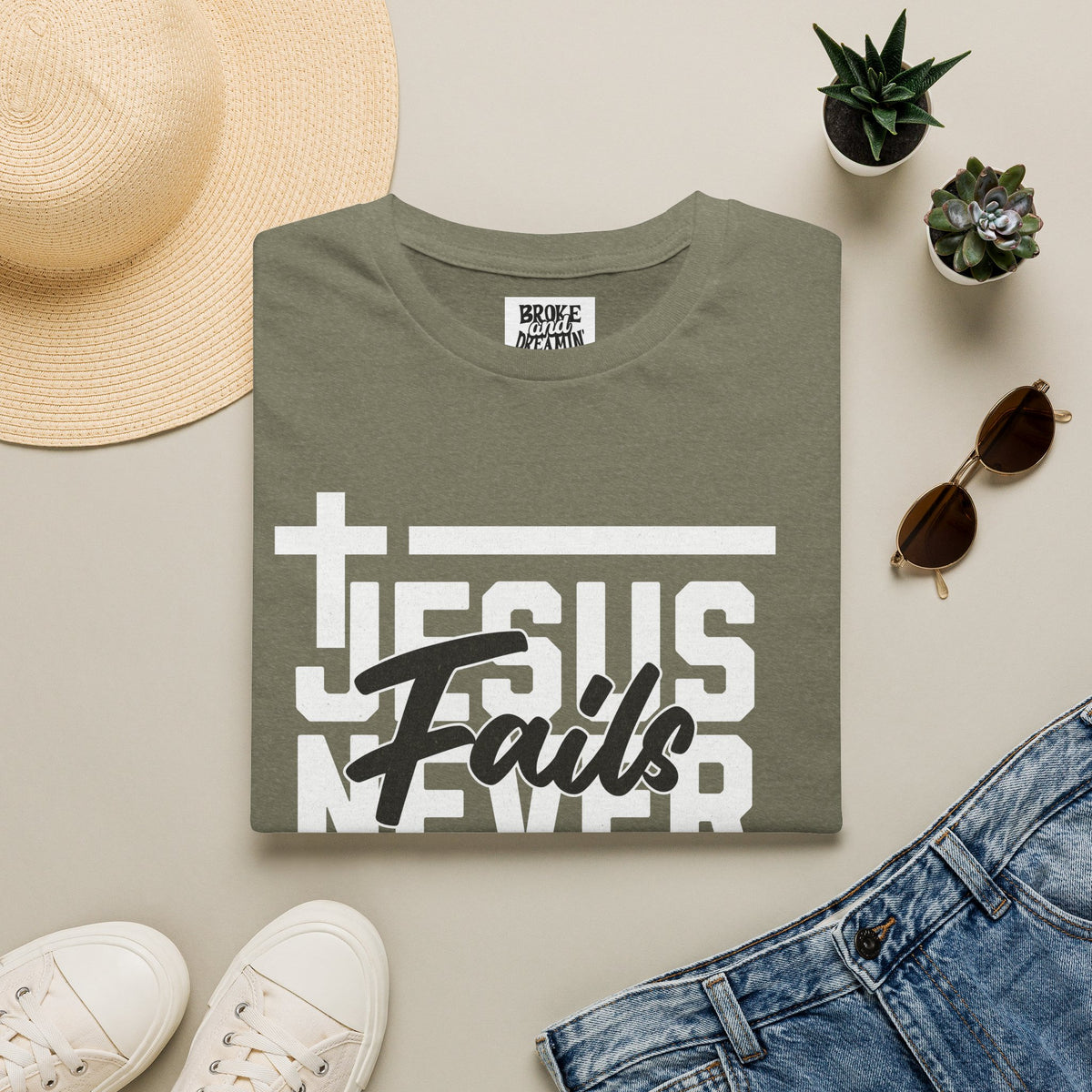 "Jesus Never Fails” Unisex T-Shirt - Broke & Dreamin' T-Shirts