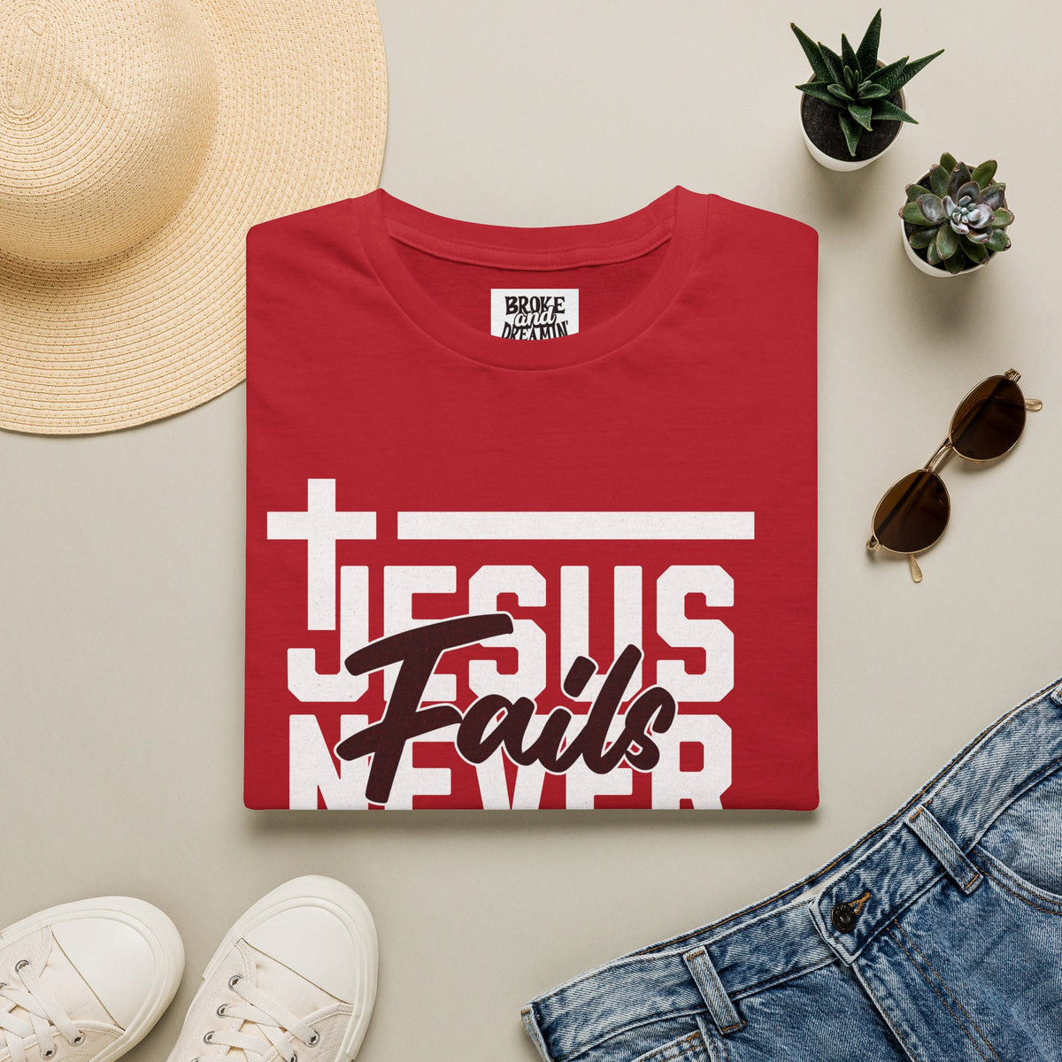 "Jesus Never Fails” Unisex T-Shirt - Broke & Dreamin' T-Shirts